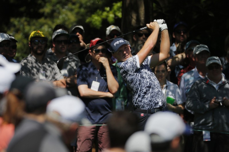 Matt Wallace of England hits off the 7th tee during the final day of practice for the 2019 Master golf tournament at the Augusta National Golf Club in Augusta, Georgia, U.S.
