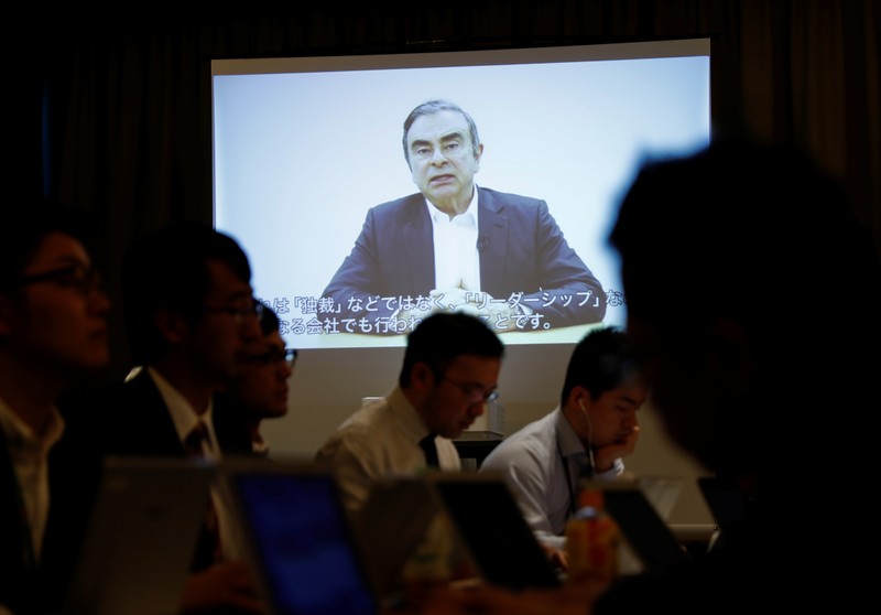 A video statement made by the former Nissan Motor chairman Carlos Ghosn is shown on a screen during a news conference by his lawyers at Foreign Correspondents' Club of Japan in Tokyo