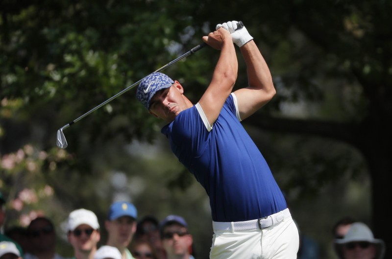 Tiger Woods' day at Masters put in peril by slipping security guard
