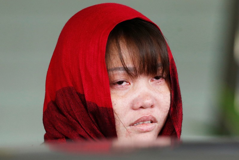 FILE PHOTO: Vietnamese Doan Thi Huong reacts as she leaves the Shah Alam High Court on the outskirts of Kuala Lumpur