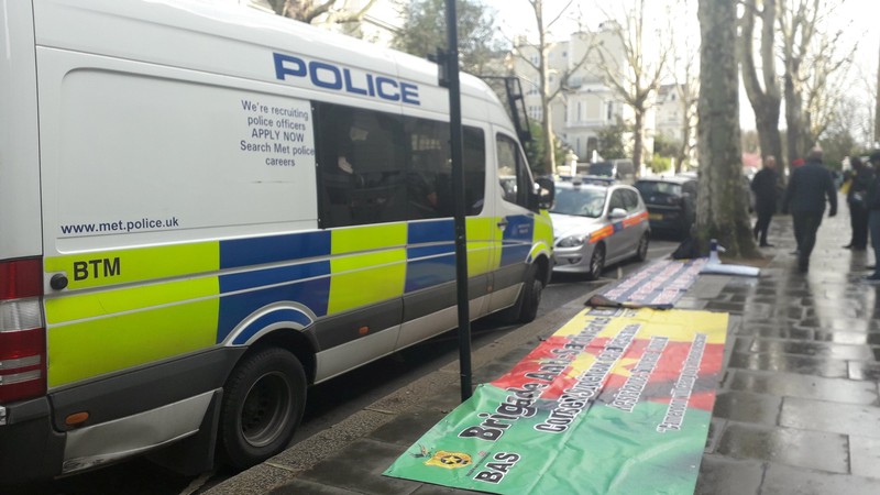 Emergency responders are seen on Holland Park Road in London