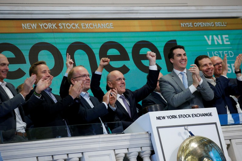 FILE PHOTO: Jan Carlson, CEO of Veoneer, Inc., rings the opening bell to celebrate it's first day of trading on the floor of the NYSE in New York