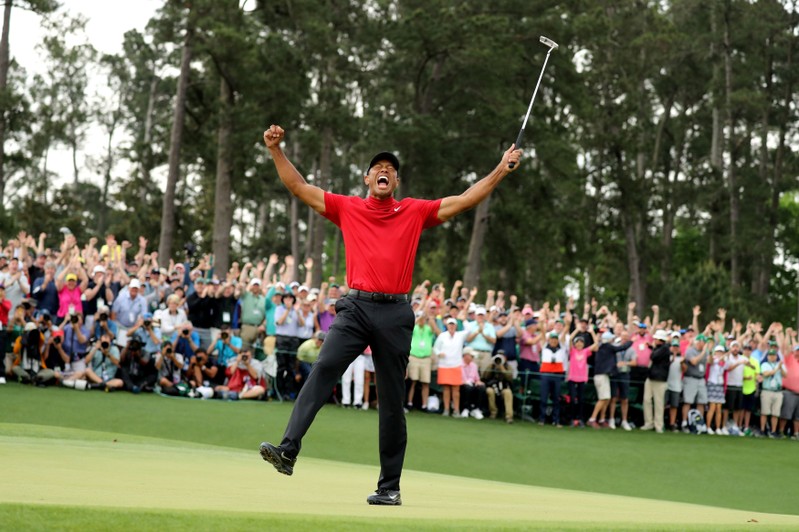 Tiger woods celebrates after winning the 2019 Masters
