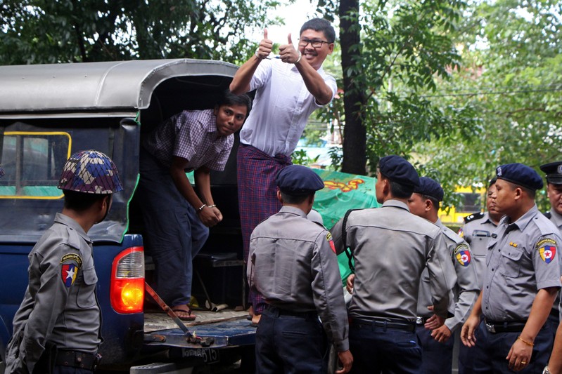 Detained Reuters journalists Wa Lone and Kyaw Soe Oo arrive at Insein court in Yangon