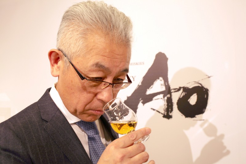 Suntory's chief blender Shinji Fukuyo smells Ao, Suntory's high-end world whisky, during its promotional event in Tokyo