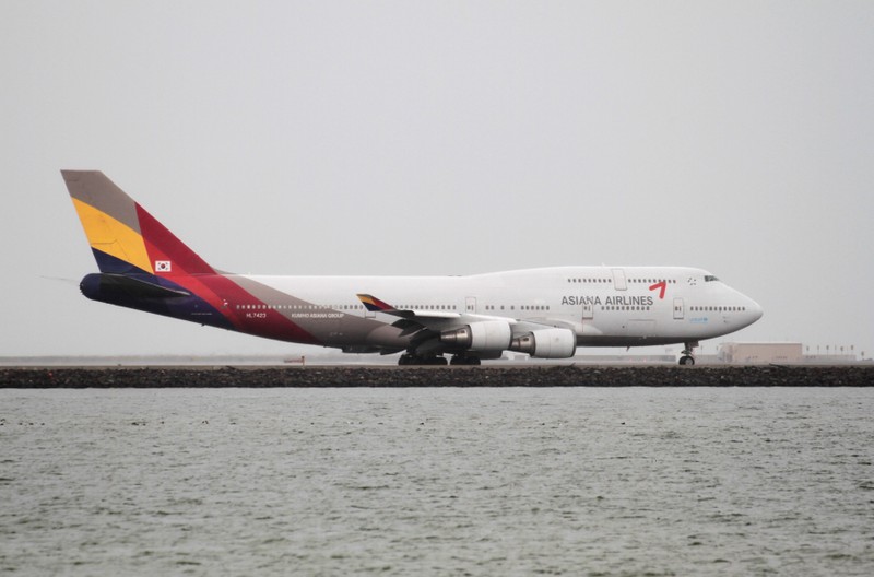 FILE PHOTO: An Asiana Airlines Boeing 747-400 taxis at San Francisco International Airport