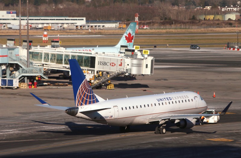 FILE PHOTO: A United Express Embraer ERJ-175LR airplane is pictured at Vancouver's international airport in Richmond,
