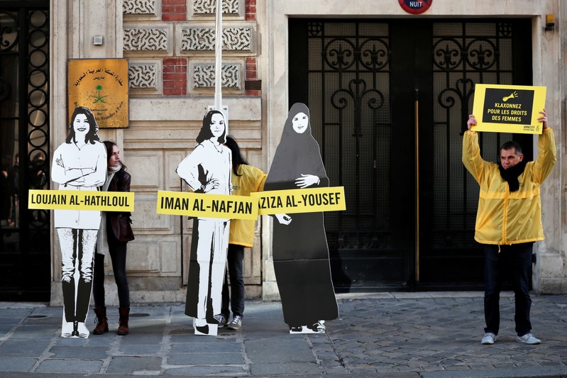 FILE PHOTO: Demonstrators from Amnesty International protest outside the Saudi Arabian Embassy on International Women's day in Paris