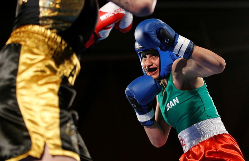 Iranian boxer Sadaf Khadem in action against French boxer Anne Chauvin during an official boxing bout in Royan