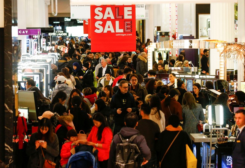 FILE PHOTO: Shoppers are seen inside the Selfridges store on Oxford Street during the Boxing Day sales in central London