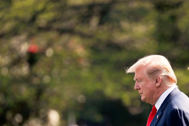 U.S. President Donald Trump prepares to board Marine One en route to his Mar-a-Lago estate in West Palm Beach, Florida following the release of the Mueller report at the White House in Washington