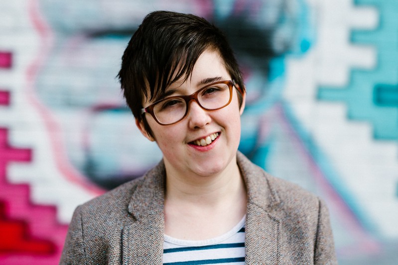 Journalist McKee poses for a portrait outside the Sunflower Pub in Belfast