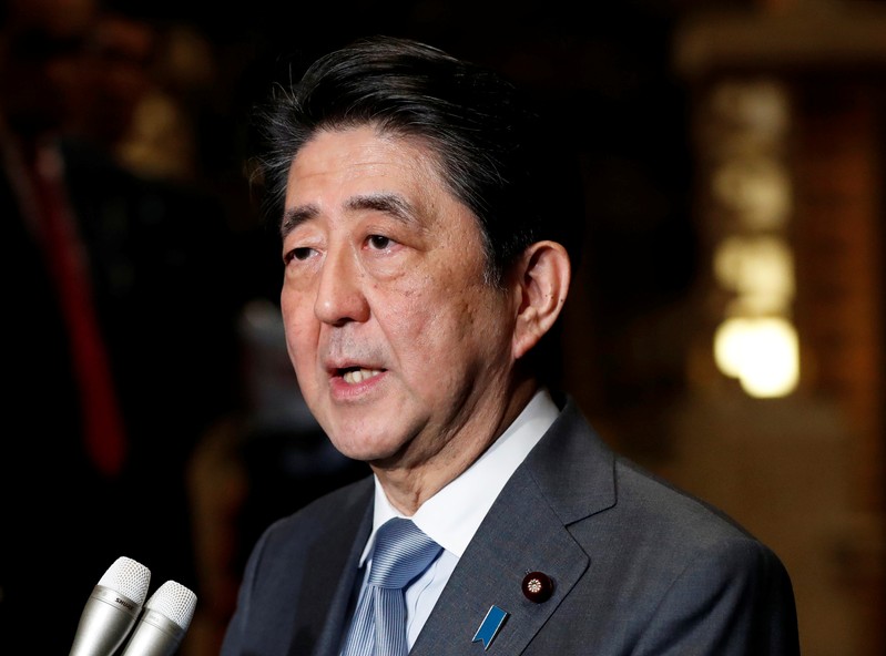 FILE PHOTO - Japan's Prime Minister Shinzo Abe speaks to media after phone talks with U.S. President Donald Trump after second North Korea-U.S. summit, in Tokyo
