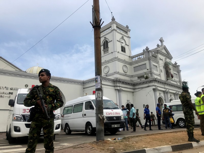 Sri Lankan military officials stand guard in front of the St. Anthony's Shrine, Kochchikade church after an explosion in Colombo
