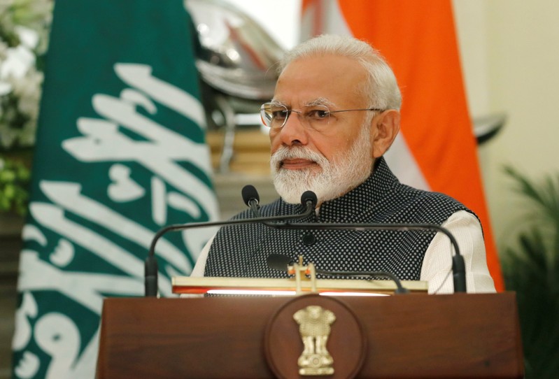 FILE PHOTO - Indian Prime Minister Narendra Modi listens to Saudi Arabia's Crown Prince Mohammed bin Salman as he speaks during their meeting at Hyderabad House in New Delhi