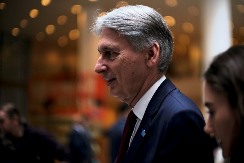 FILE PHOTO: Chancellor of the Exchequer Philip Hammond attends the IMF and World Bank's 2019 Annual Spring Meetings, in Washington