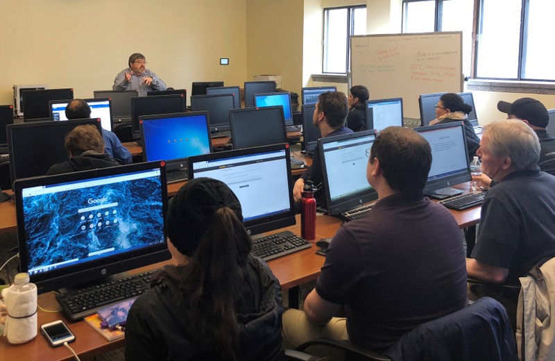 Patrick McHugh lectures to an information technology class at the Milwaukee Area Technical College in Milwaukee