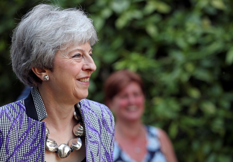 Britain's Prime Minister Theresa May leaves church in Sonning