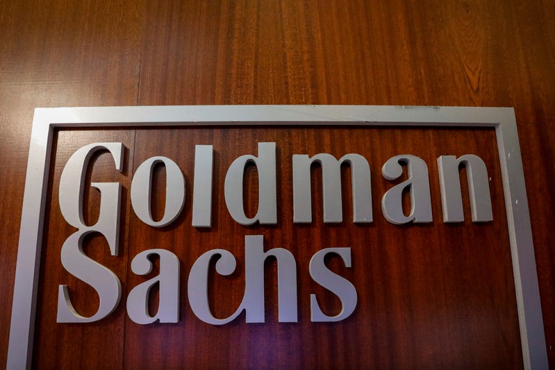 FILE PHOTO - The Goldman Sachs company logo is seen in the company's space on the floor of the NYSE in New York