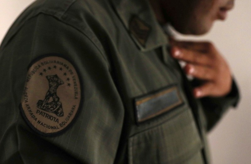A Venezuelan military deserter of the National Guard, who doesn't want to be identified, is seen in the border city of Pacaraima