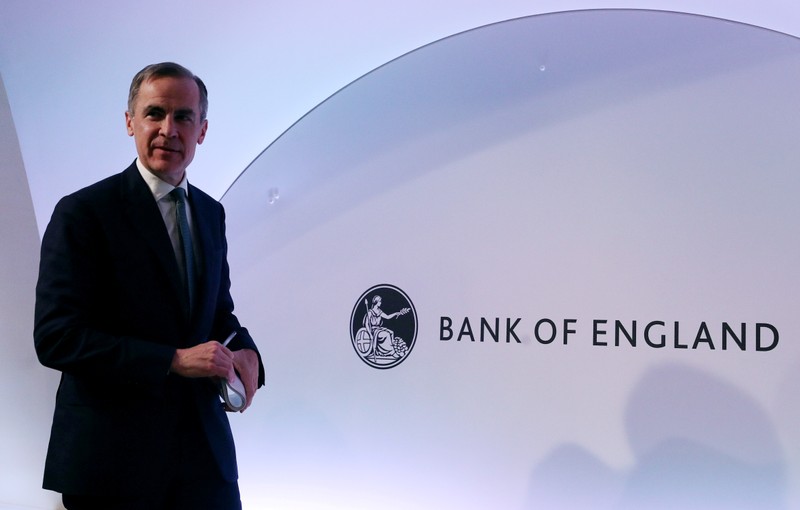 FILE PHOTO: The Governor of the Bank of England, Mark Carney leaves after a news conference at the Bank of England in London