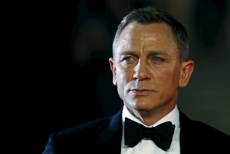 Daniel Craig poses for photographers as he attends the world premiere of the new James Bond 007 film