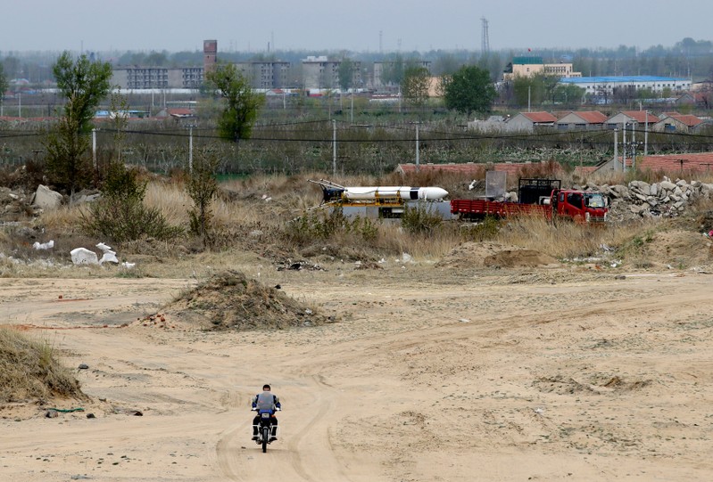 The Wider Image: China's start-ups go small in age of 'shoebox' satellites