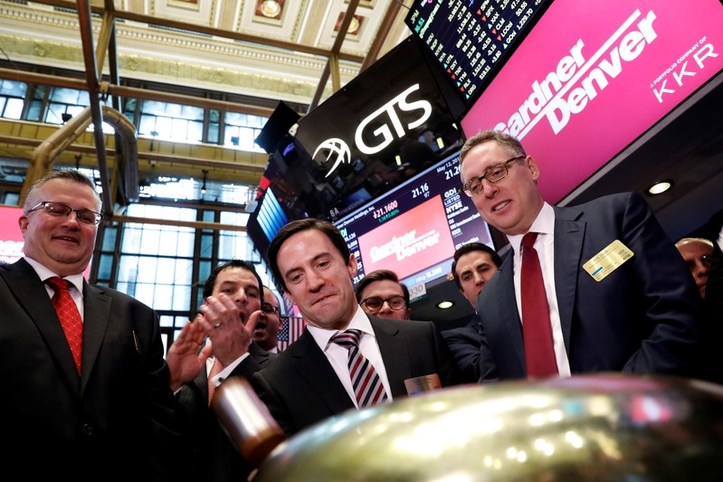 Vicente Reynal, CEO of Gardner Denver, rings a ceremonial bell to celebrate his company's IPO on the floor of the NYSE in New York
