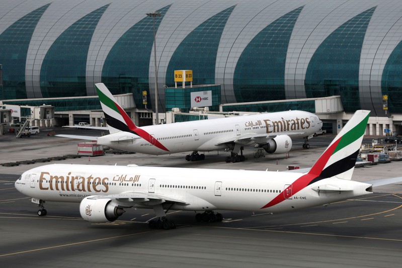 FILE PHOTO: Emirates Airline Boeing 777 planes at are seen Dubai International Airport in Dubai