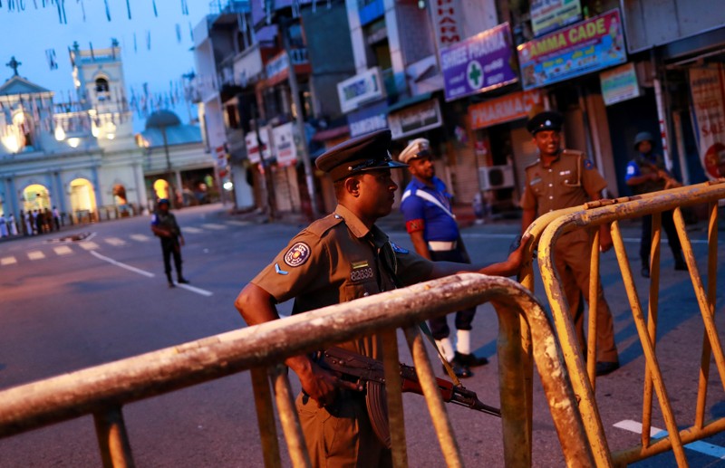 Security personnel stand guard in front of St Anthony's Shrine in Colombo
