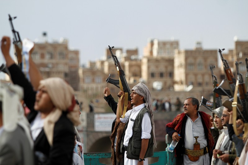 FILE PHOTO - Houthi supporters attend a rally to mark the first anniversary of the killing of Saleh al-Sammad, who was the head of Houthi movement's Supreme Political Council, by an air strike, in Sanaa