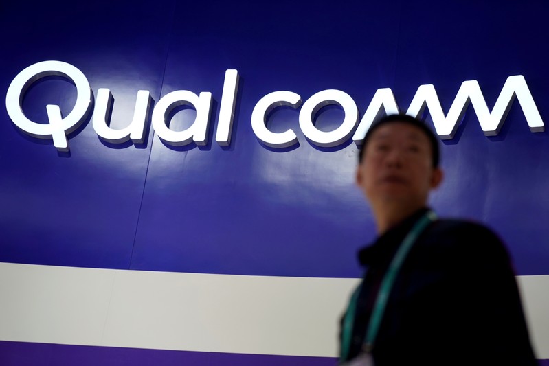 FILE PHOTO: A Qualcomm sign is seen during the China International Import Expo (CIIE), at the National Exhibition and Convention Center in Shanghai