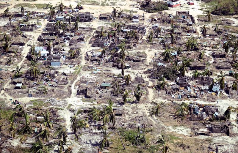Buildings damaged during Cyclone Kenneth are seen from the air in a village north of Pemba, Mozambique