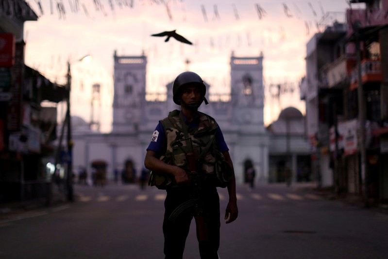 FILE PHOTO: A security officer stands guard outside St. Anthony's Shrine in Colombo