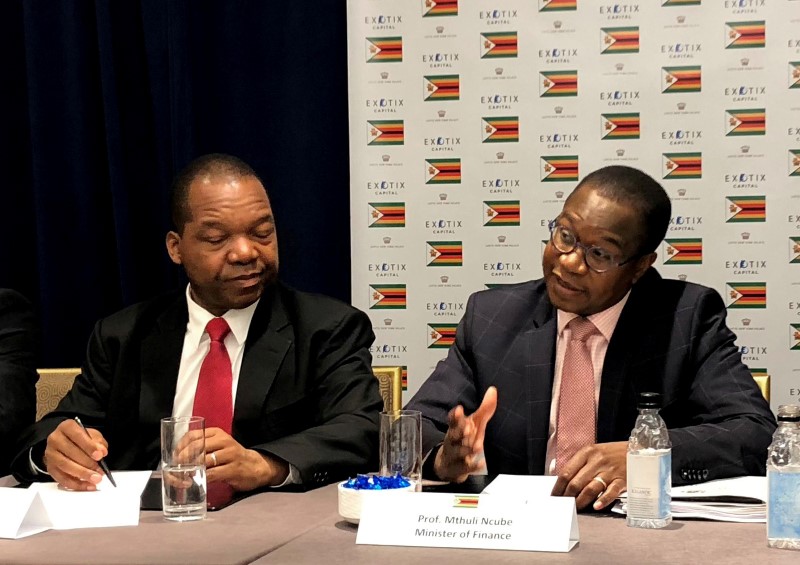 FILE PHOTO: Reserve Bank of Zimbabwe Governor Mangudya and ZimbabweÕs Finance Minister Ncube brief reporters in New York