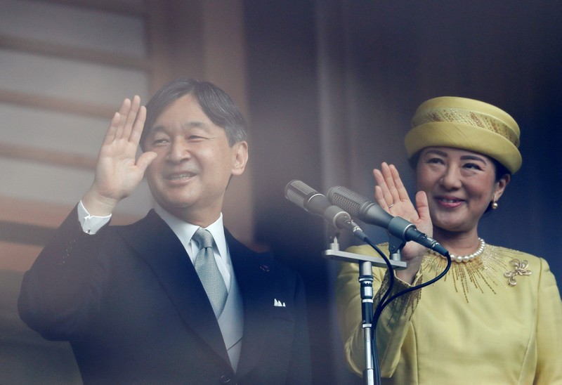 Japan's Emperor Naruhito and Empress Masako greet well-wishers during their first public appearance at the Imperial Palace in Tokyo