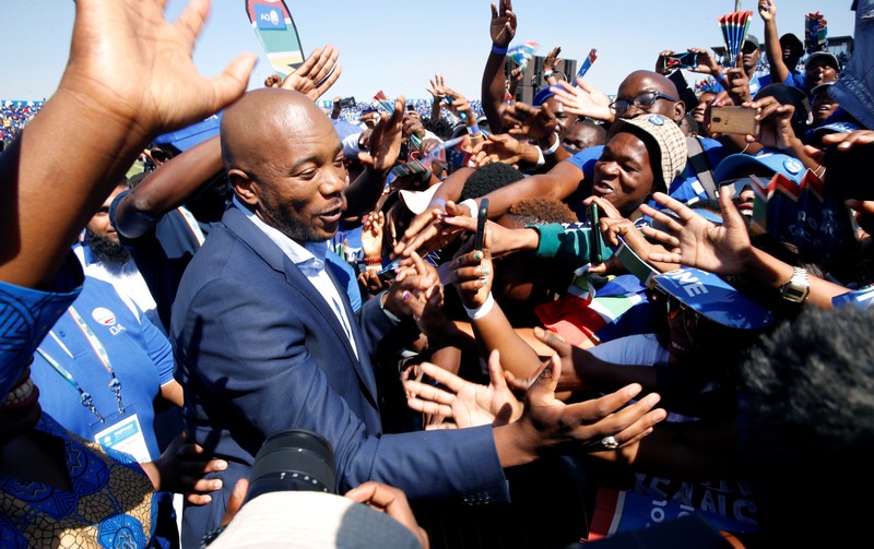 Supporters cheer Mmusi Maimane, leader of South Africa's largest opposition party, the Democratic Alliance (DA), at his party's final election rally ahead of the country's May 8 poll, in Soweto near Johannesburg