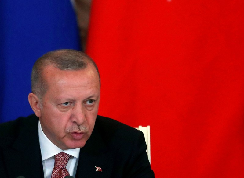 FILE PHOTO: Russian President Vladimir Putin and Turkish President Tayyip Erdogan meet in Moscow