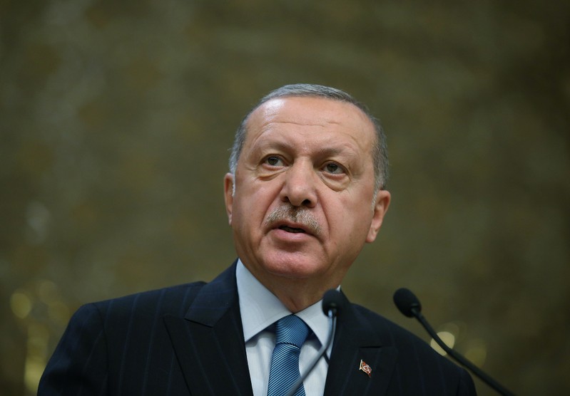 FILE PHOTO - Turkish President Erdogan speaks during a meeting in Ankara