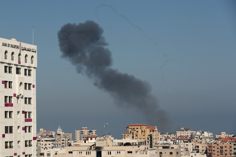 Smoke rises following an Israeli air strike in Gaza City