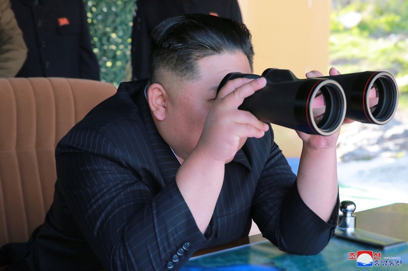 North Korea's leader Kim Jong Un supervises a military drill in North Korea