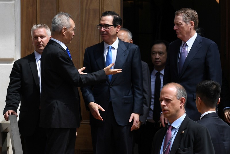 Chinese Vice Premier Liu He talks with U.S. Treasury Secretary Mnuchin and Trade Representative Lighthizer as he leaves trade talks in Washington