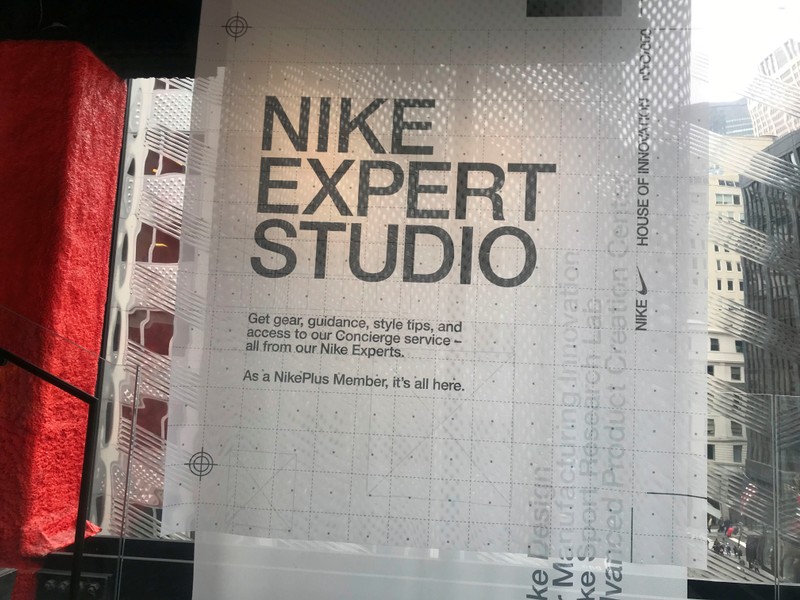 A sign is seen at the Nike flagship store on Fifth Ave in Manhattan, with a top floor dedicated to Nike Plus members where they can shop for exclusive merchandise, in New York