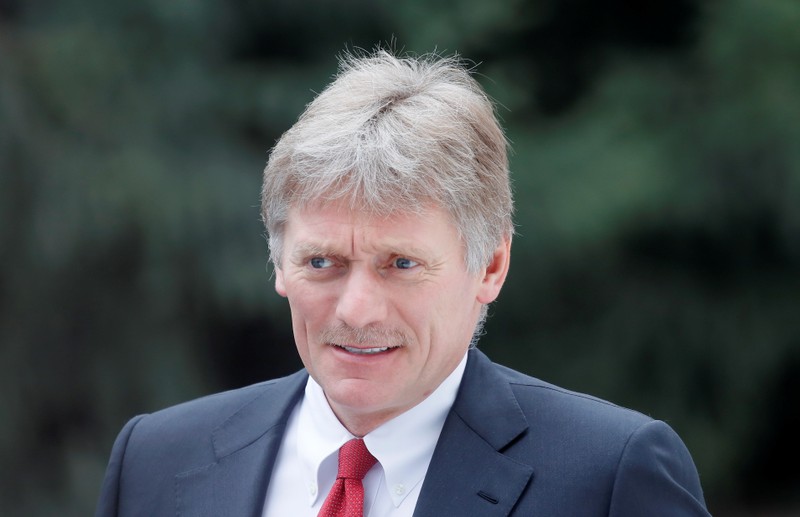 Kremlin spokesman Peskov waits before a welcoming ceremony attended by Russian President Putin and his Kyrgyz President Jeenbekov in Bishkek