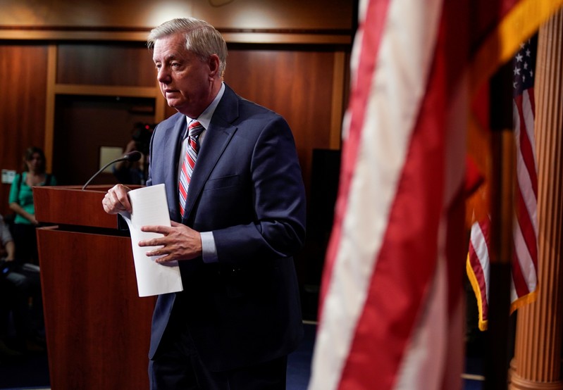 FILE PHOTO: Chairman of the Senate Judiciary Committee Lindsey Graham (R-SC) speaks to the media on Capitol Hill in Washington.