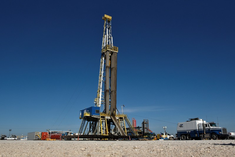 FILE PHOTO: A drilling rig on a lease owned by Oasis Petroleum performs logging operations in the Permian Basin near Wink