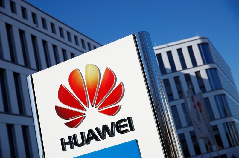 FILE PHOTO: The logo of Huawei Technologies is pictured in front of the German headquarters of the Chinese telecommunications giant in Duesseldorf