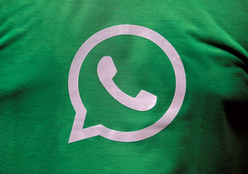 FILE PHOTO: A logo of WhatsApp is pictured on a T-shirt worn by a WhatsApp-Reliance Jio representative during a drive by the two companies to educate users, on the outskirts of Kolkata