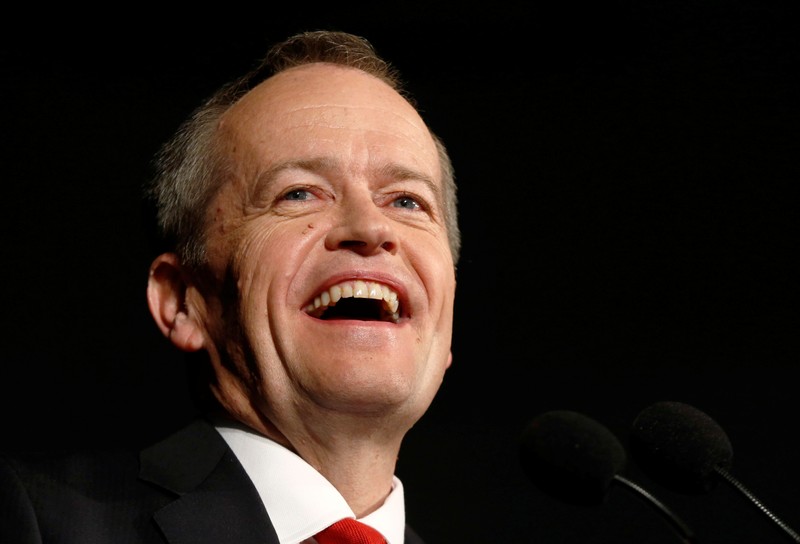 Australian Labor Party opposition leader Bill Shorten laughs during remarks at his election night party in Melbourne