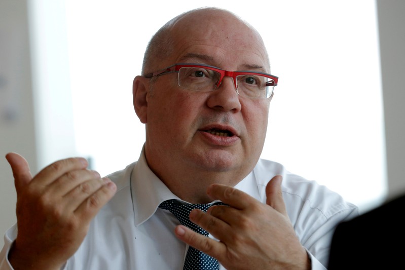 FILE PHOTO: CEO of French grid operator RTE Francois Brottes attends an interview at La Defense, near Paris